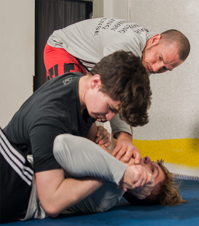 Photo of Jeremy Helton teaching MMA class in Bloomington Indiana
